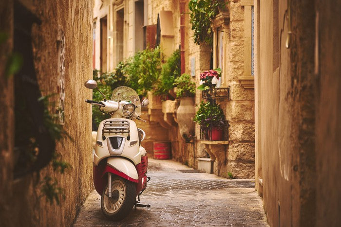 Medieval alley moped