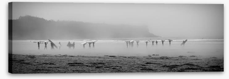 Surfers in the mist