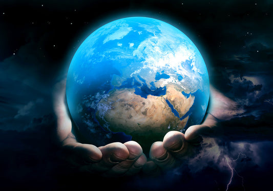 In his hands