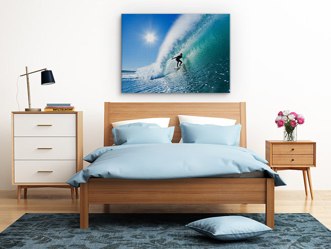 Surfer on blue ocean wave