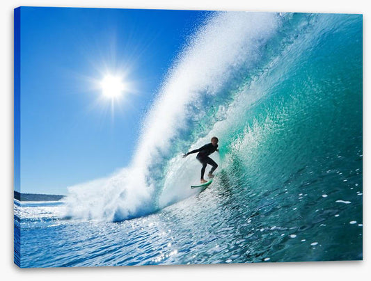 Surfer on blue ocean wave