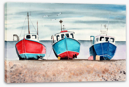 Three beached boats