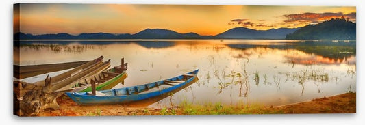 Rowing boats at sundown