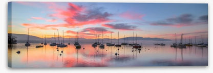 Sunrise and sailboats