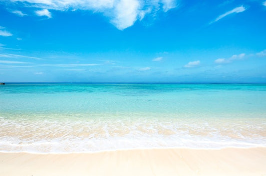 Blue skies white sand