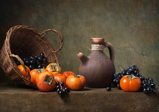 Persimmons and grapes