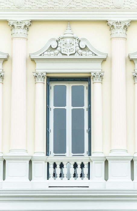 Behind the balcony