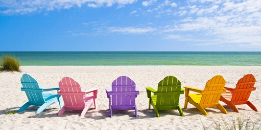 Rainbow chairs on a sunny beach