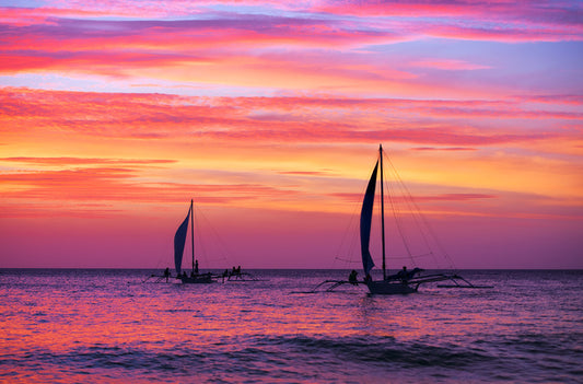 Sunset sail silhouettes