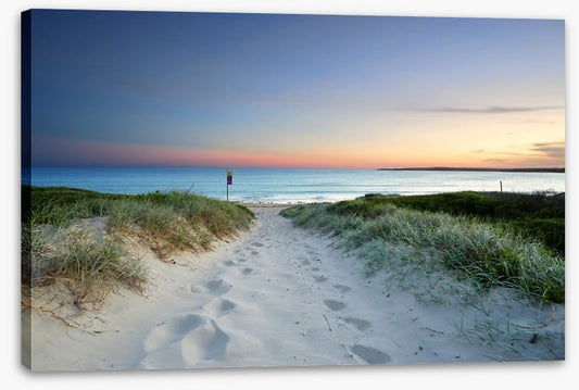Sandy beach trail at sundown