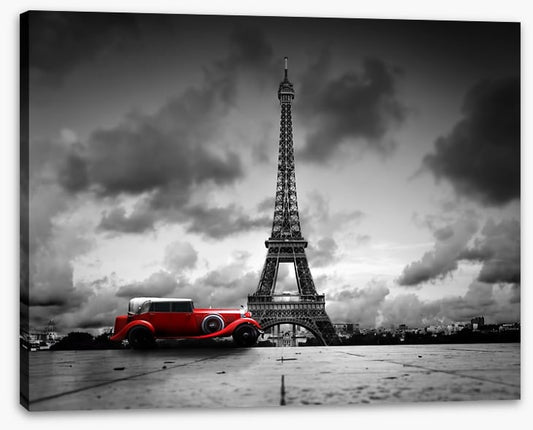 The Eiffel Tower and red car