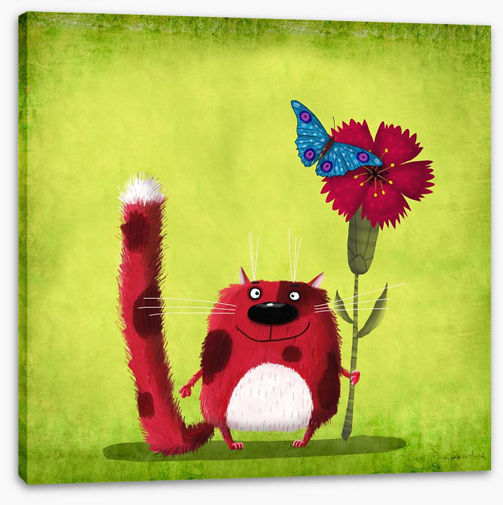 Red cat with cornflower