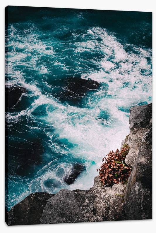 Below the ocean cliff