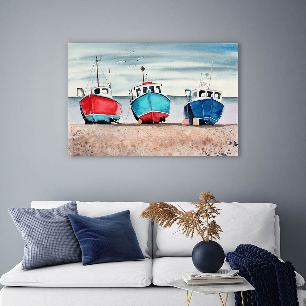 Three beached boats